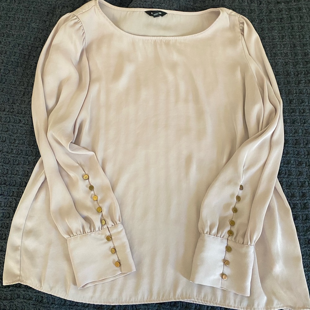 Blush pink blouse with gold buttons on sleeve
